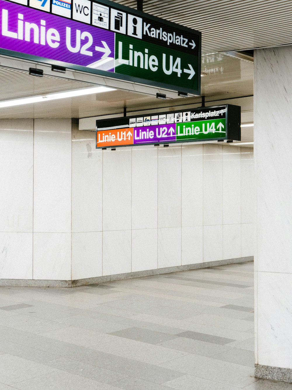 purple and white kanji text signage