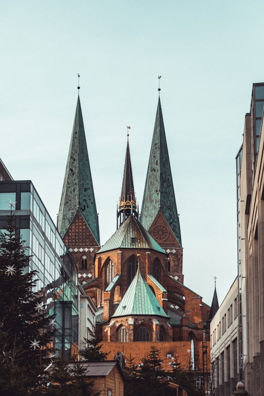 brown and beige concrete building in St. Mary's Church, Lübeck Germany