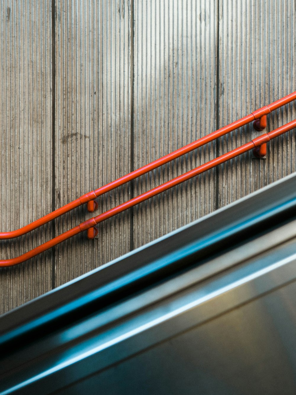 orange and black metal railings