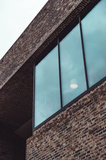 Commercial building exterior showcasing durable and weather-resistant brick cladding in Bangalore