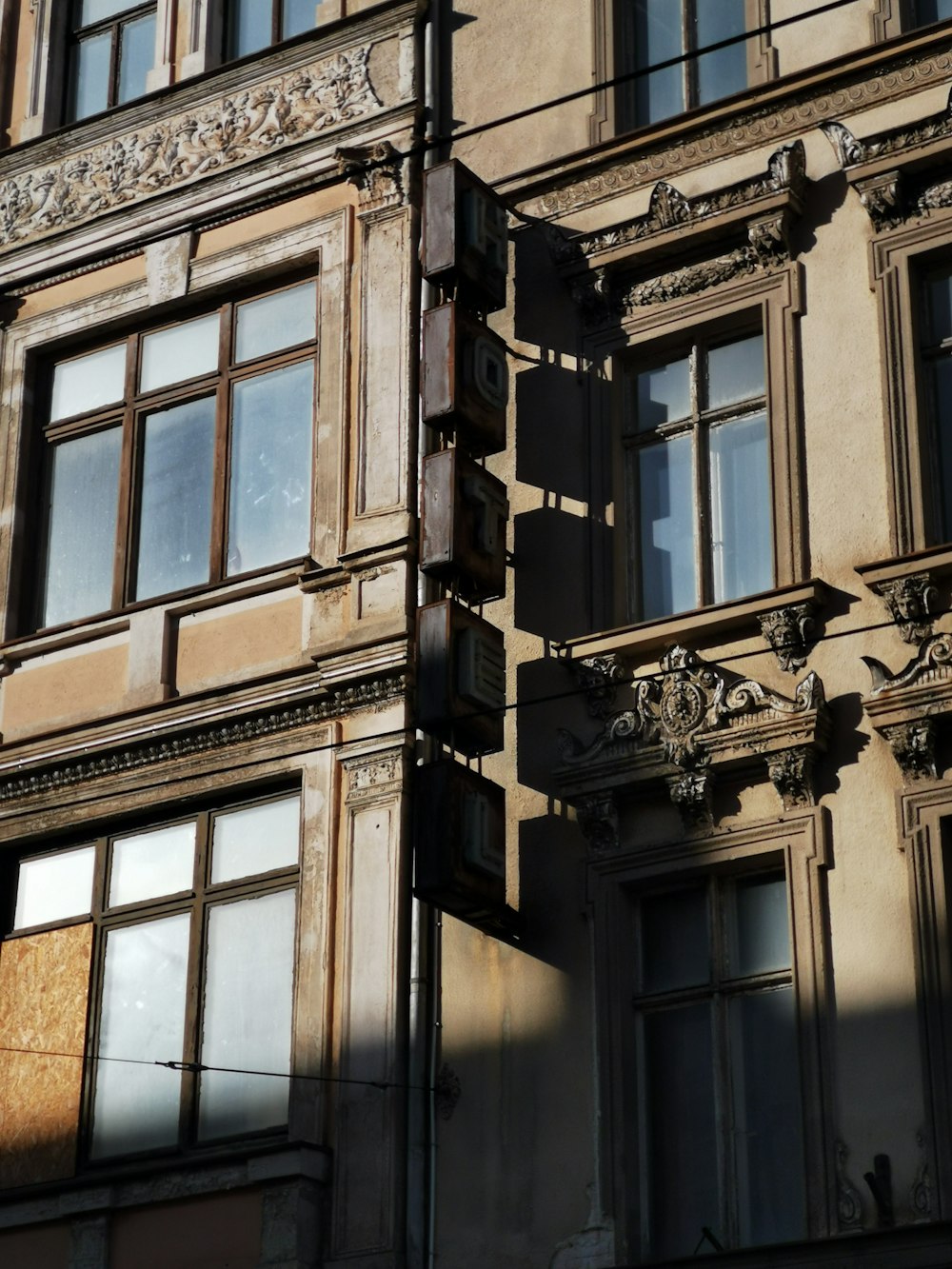 brown wooden framed glass window