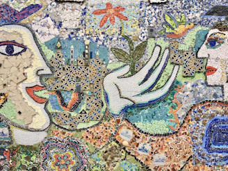 green white and brown floral textile