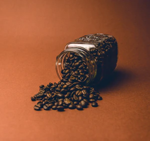 black coffee beans on silver ring