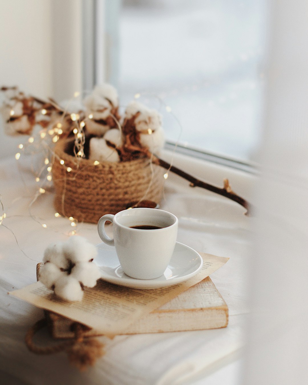 white ceramic mug on brown wooden chopping board