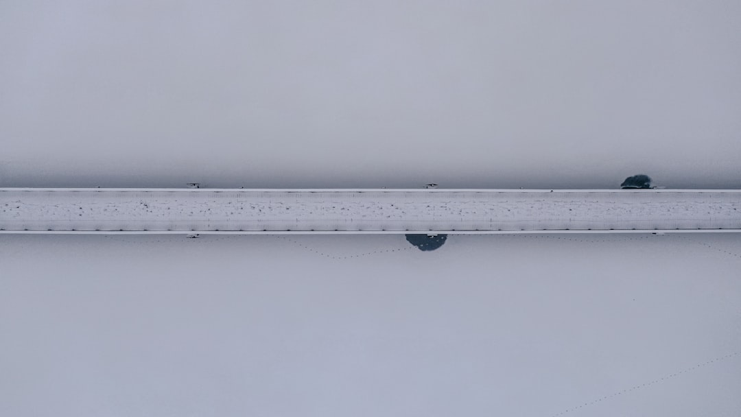 white and black ruler on white surface