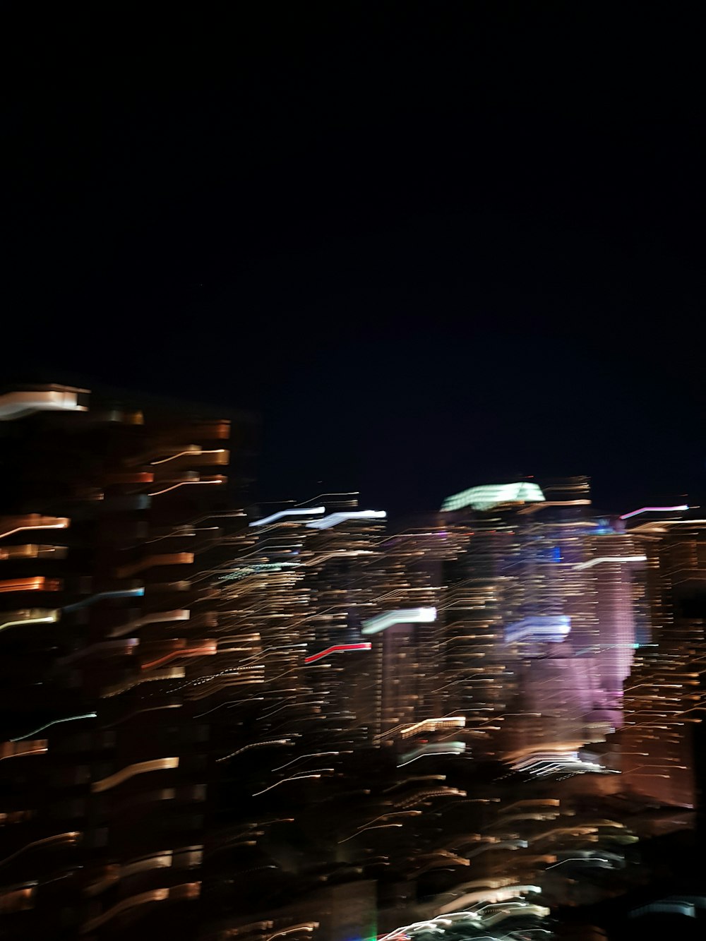 people walking on street during night time