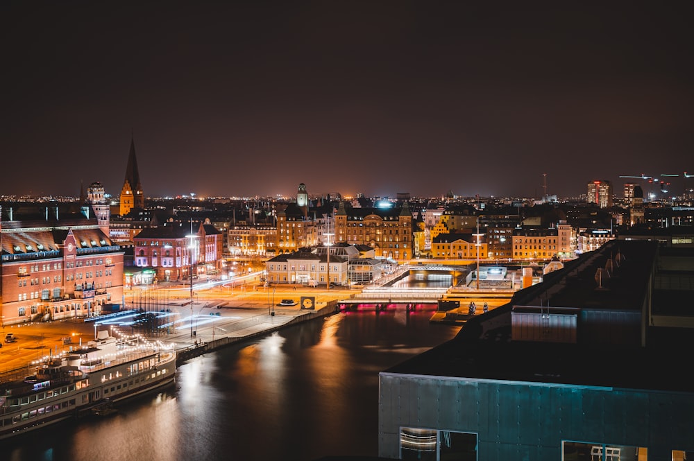 city with high rise buildings during night time