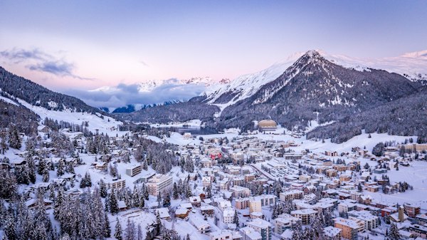 White and black mountain under blue sky during daytime — Davos, Switzerland
