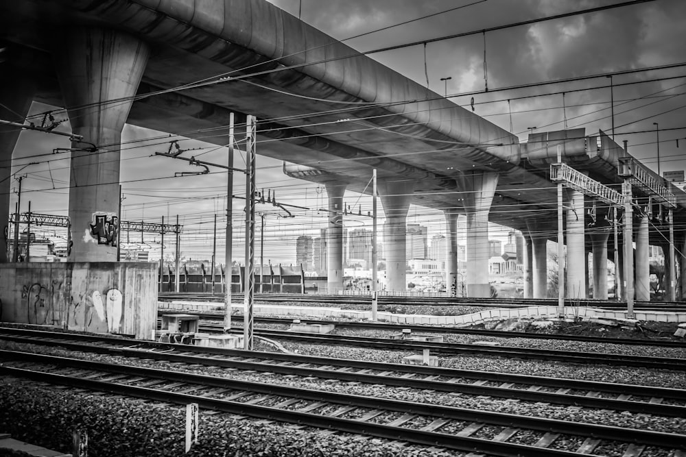 grayscale photo of train rail