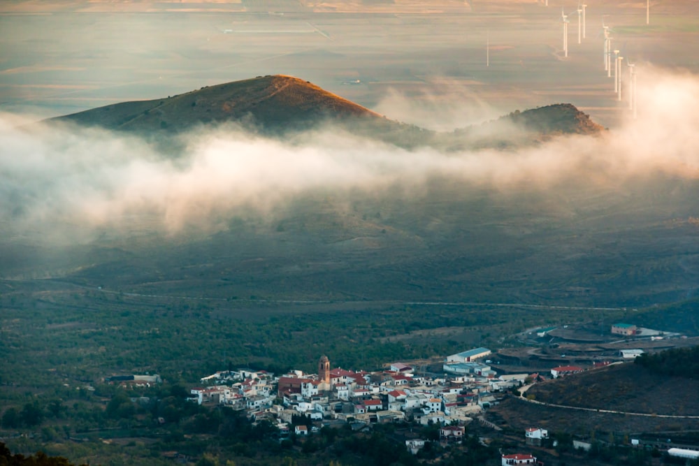 aerial view of city near mountain during daytime