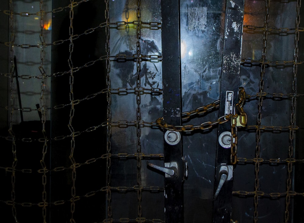 black metal door with padlock