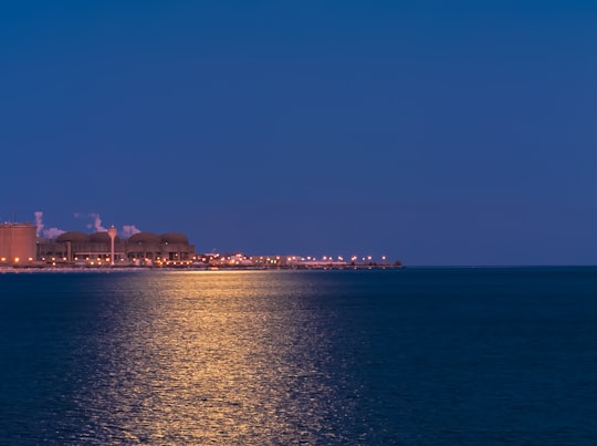 city skyline across body of water during night time in Pickering Canada