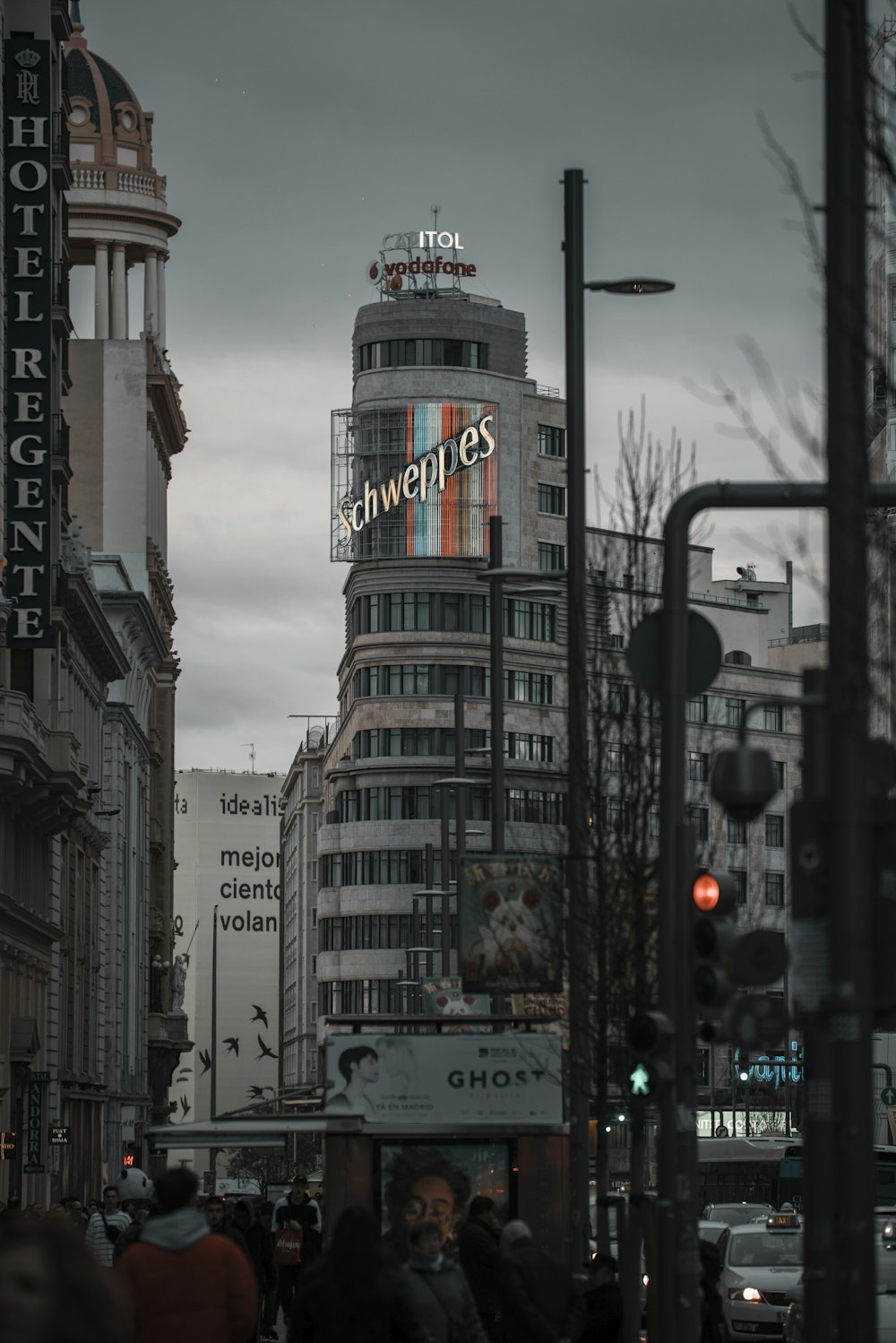 white and red tower in the city