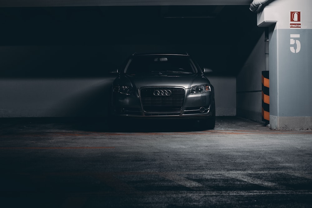 black bmw m 3 coupe parked on tunnel