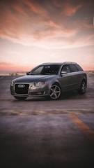 black audi suv on road during daytime