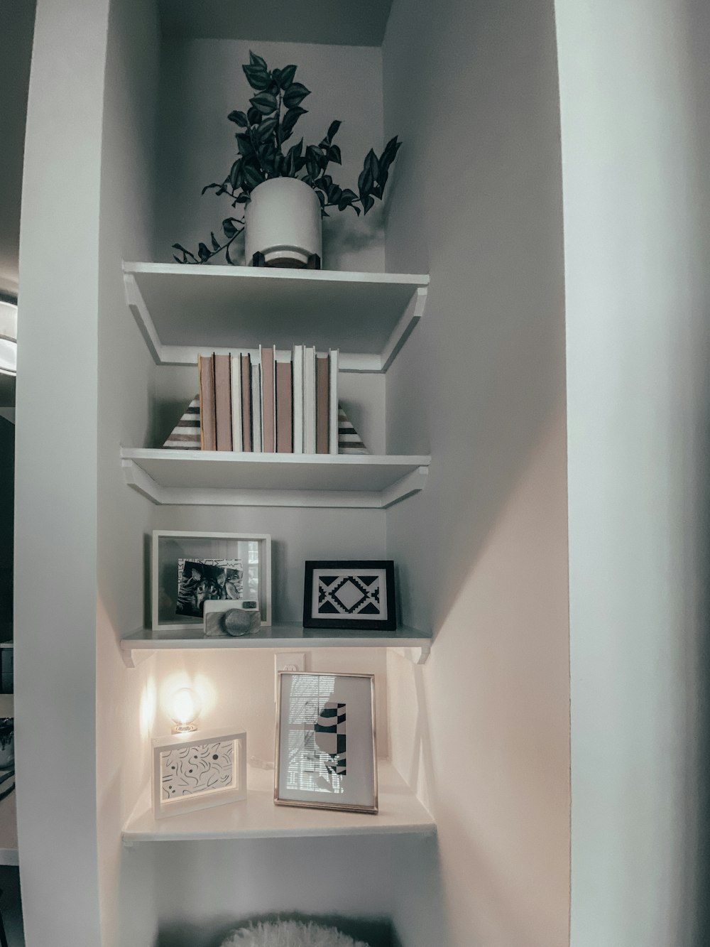 white wooden wall mounted shelf