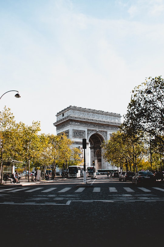 people walking on pedestrian lane during daytime in Arc de Triomphe France