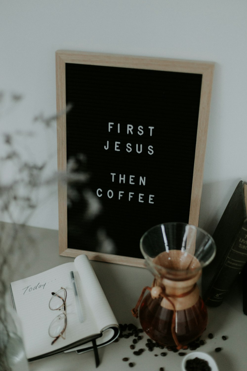 brown wooden framed black and white quote board