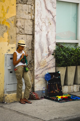 Close-up of a customer happily examining a handcrafted item at Aspen Valley Solutions.
