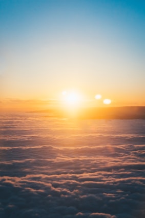 clouds and sun during sunset