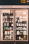 black and brown wooden framed glass cabinet