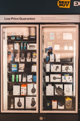 black and brown wooden framed glass cabinet