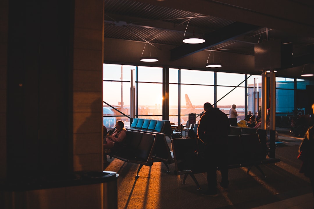 people sitting on chair inside room