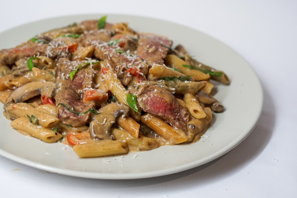 pasta dish on white ceramic plate