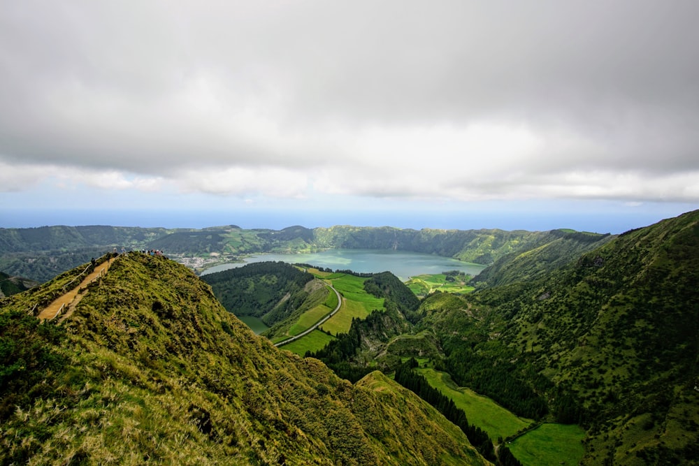 green mountains under white clouds during daytime