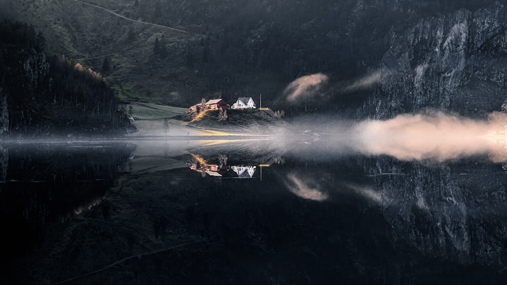 people riding on boat on body of water during night time