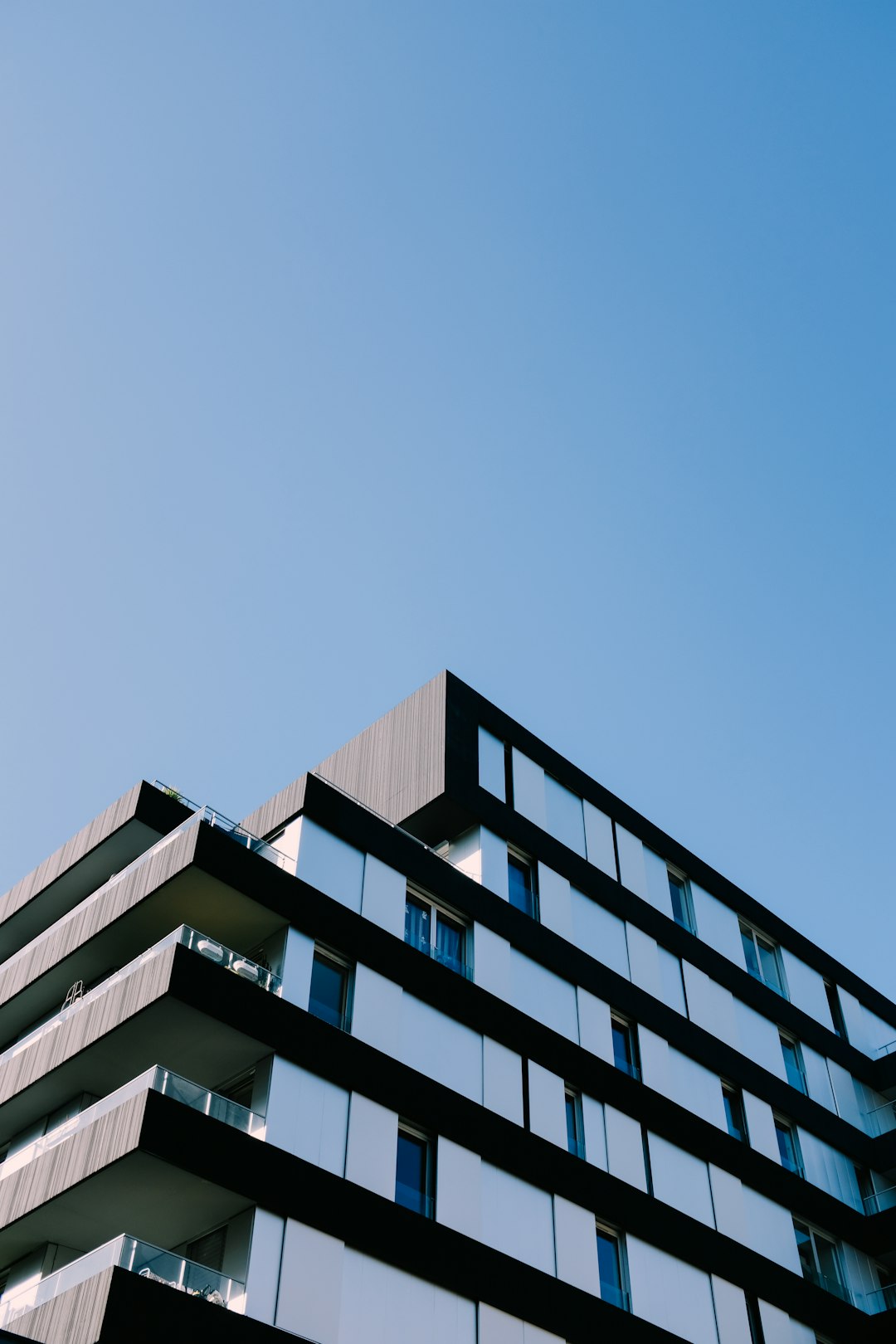 white concrete building under blue sky during daytime