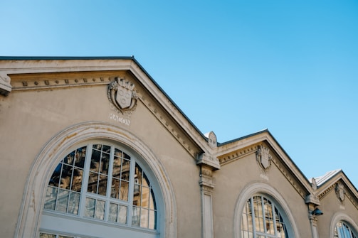 Facade of a restored historic building blending old architecture with modern design.