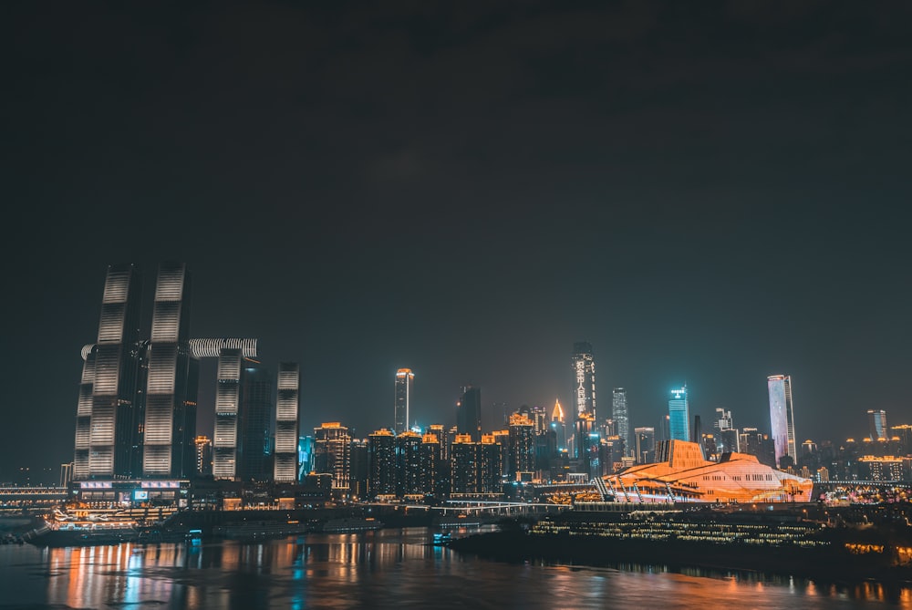 city skyline during night time