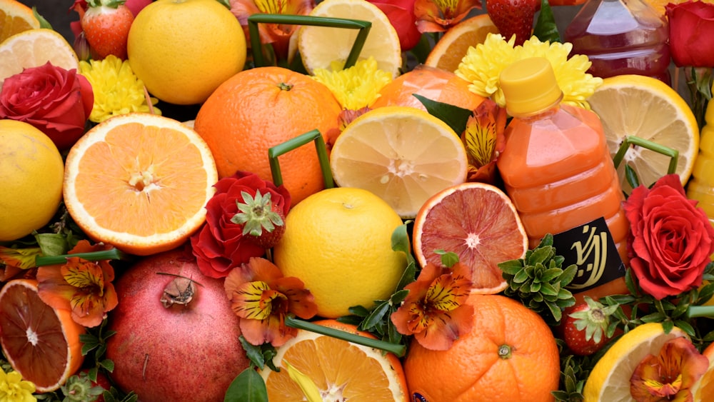 sliced lemon fruit and orange fruit