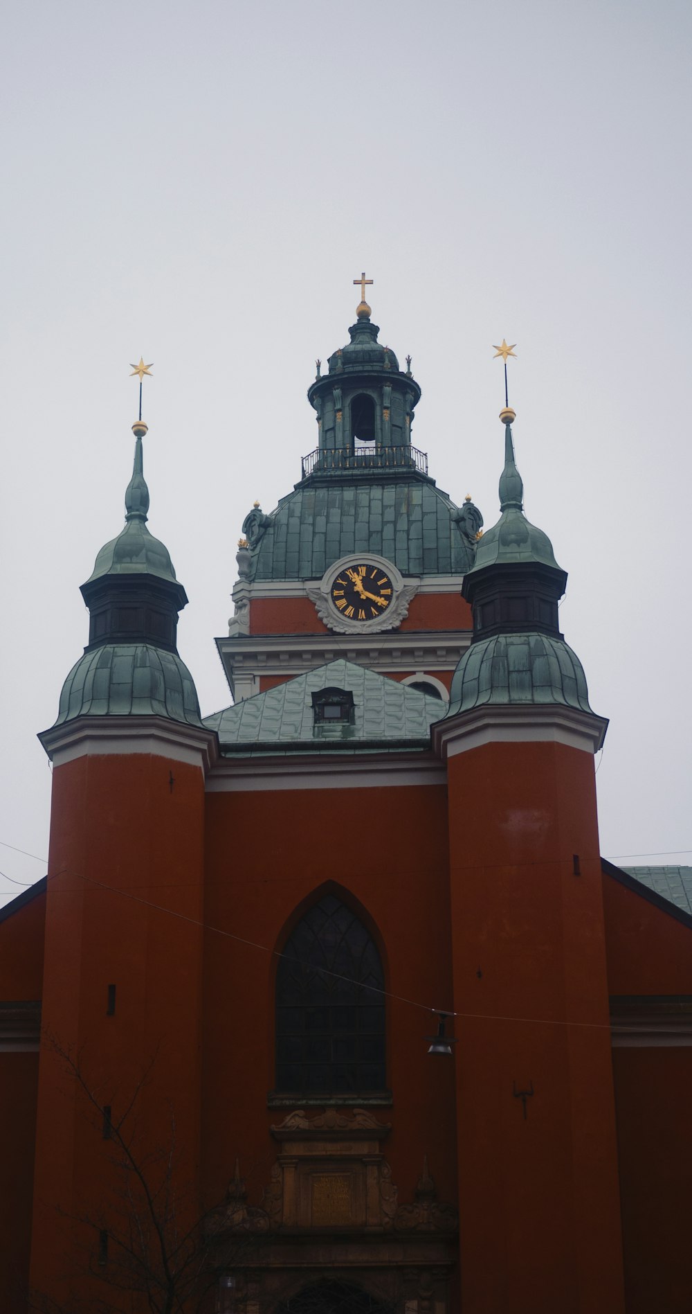 a large building with a clock on the top of it