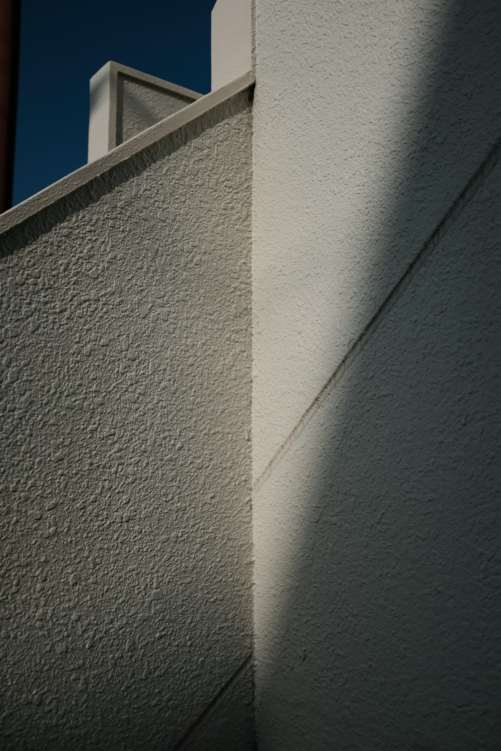 white concrete wall during daytime