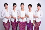 group of women in white dress