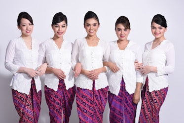 group of women in white dress