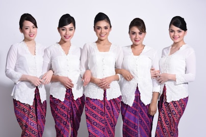group of women in white dress