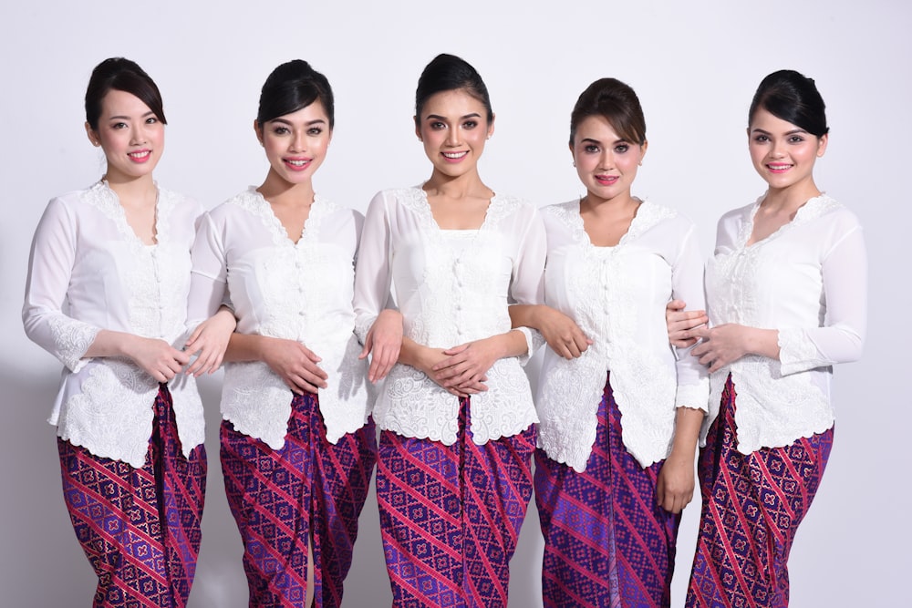 group of women in white dress