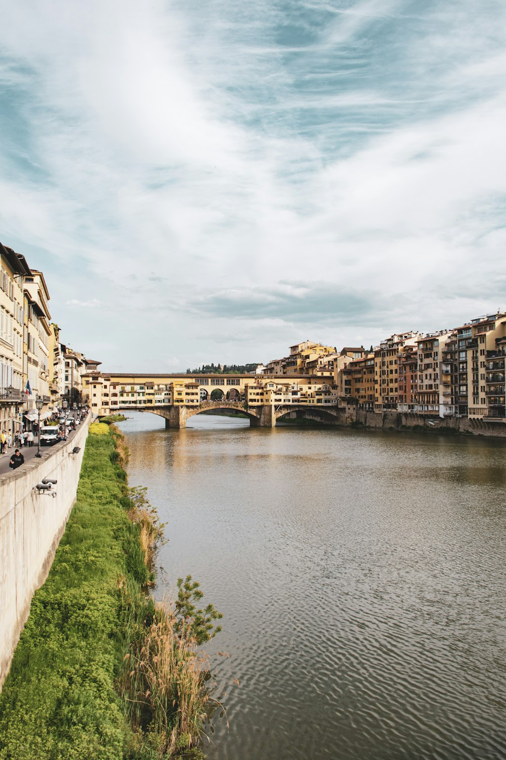 river between buildings during daytime