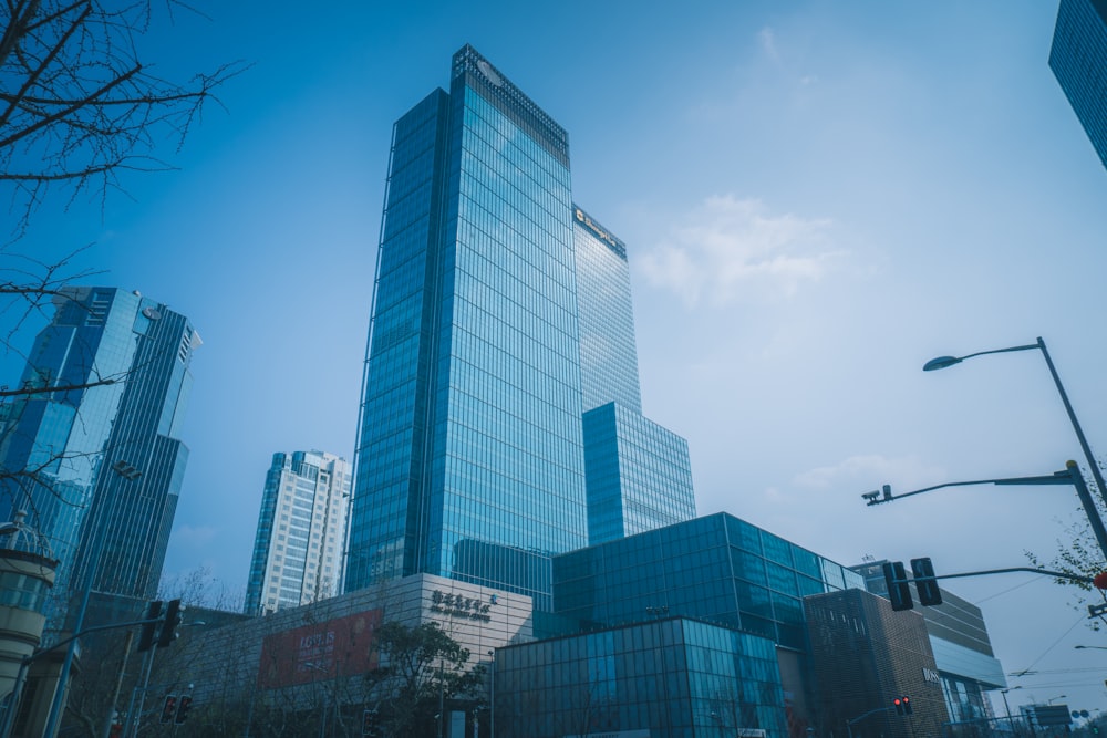 white and blue concrete building under blue sky during daytime