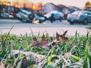A close-up of a car accident scene with emergency services in action.