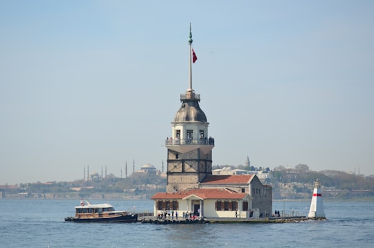 white and brown concrete building near body of water during daytime in Park Turkey