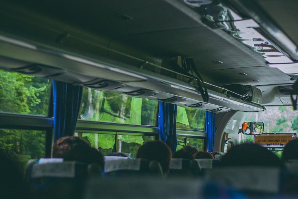 people sitting on bus seats