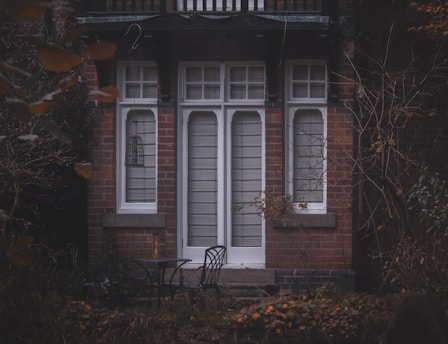 white wooden framed glass window