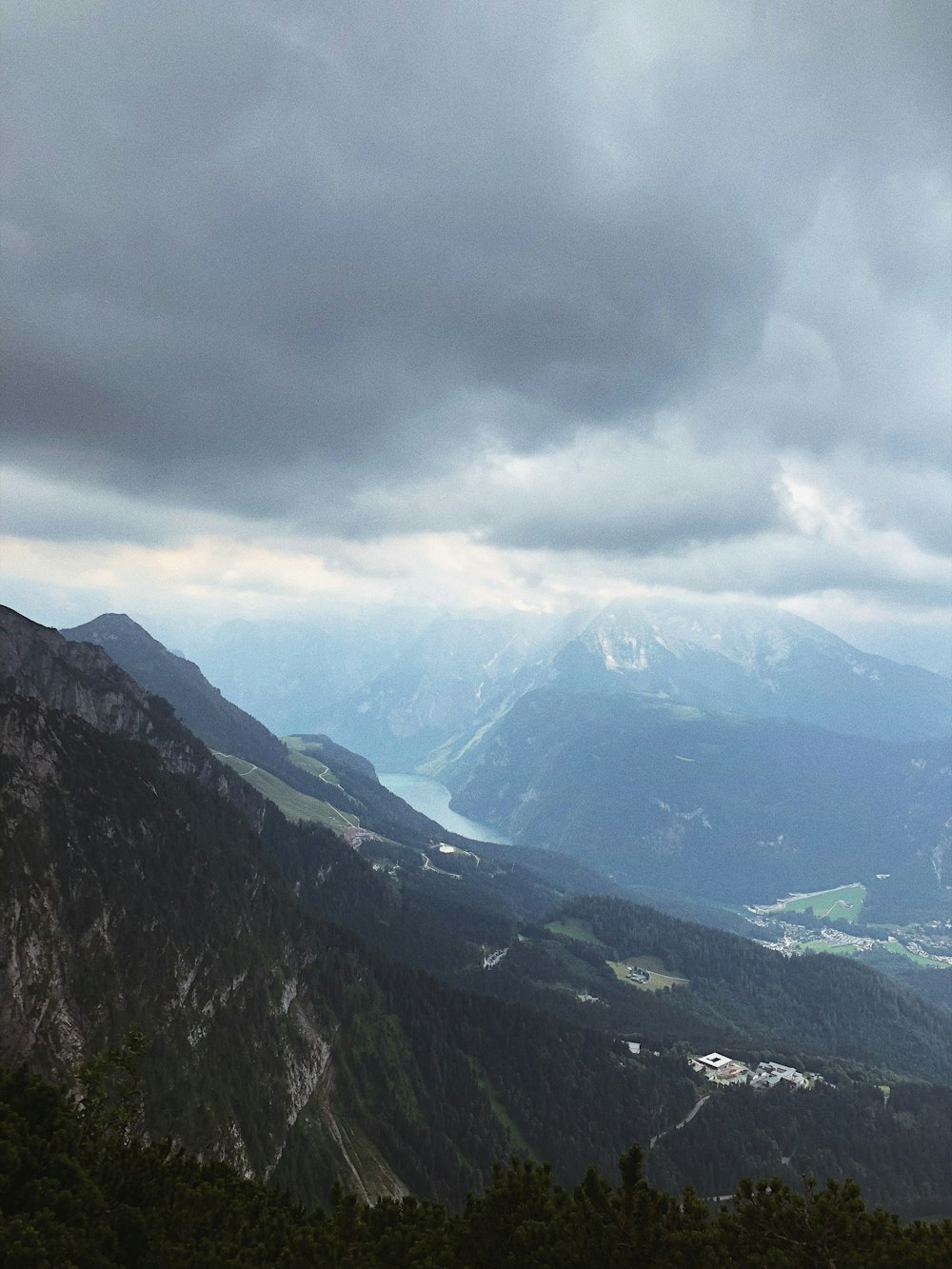 green and brown mountains under white clouds during daytime