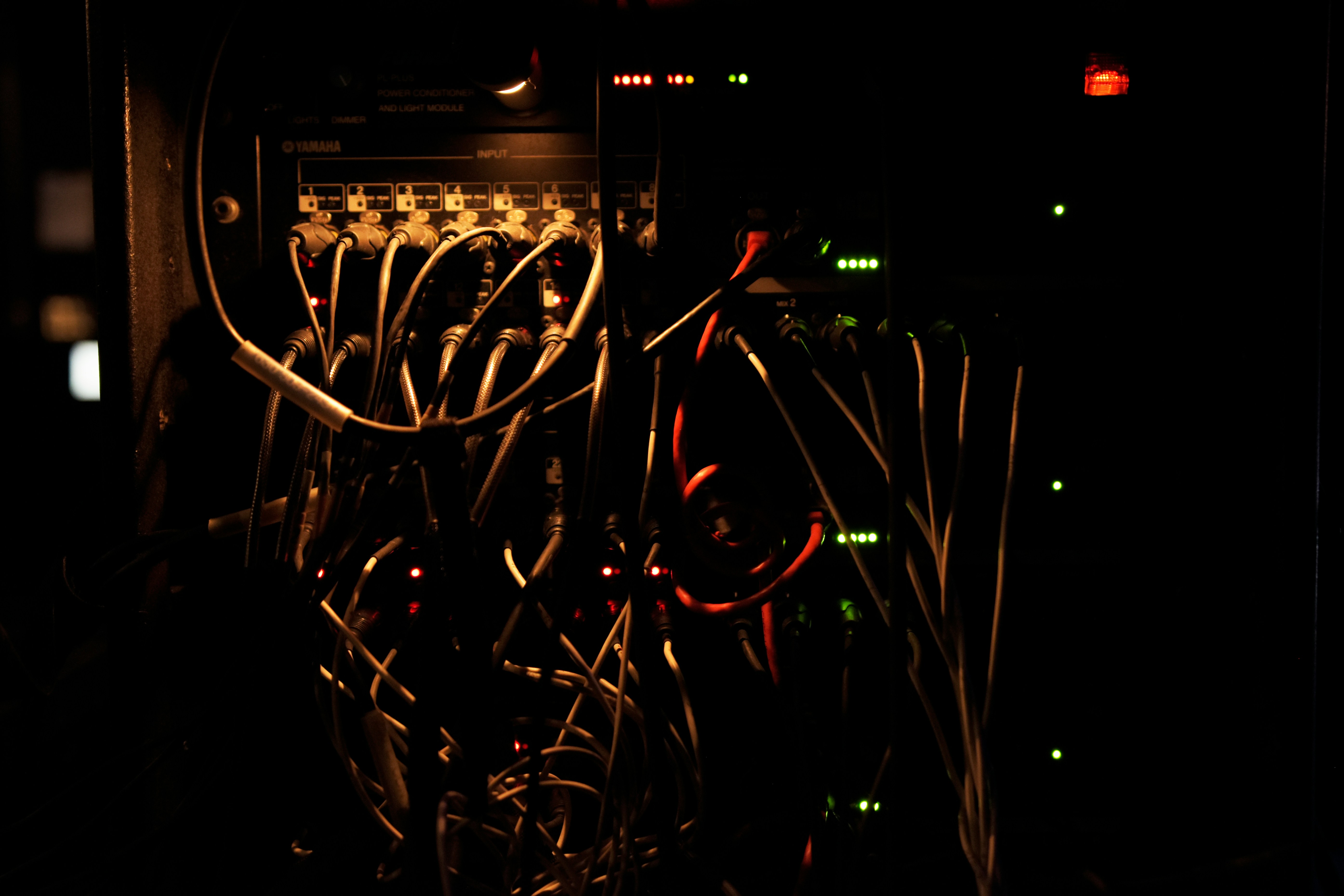 Server room with red and yellow lighting