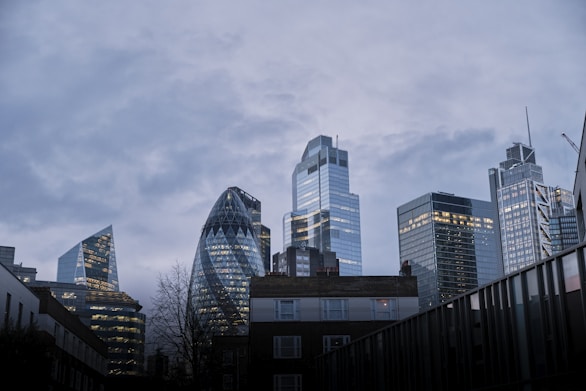high rise buildings under gray sky