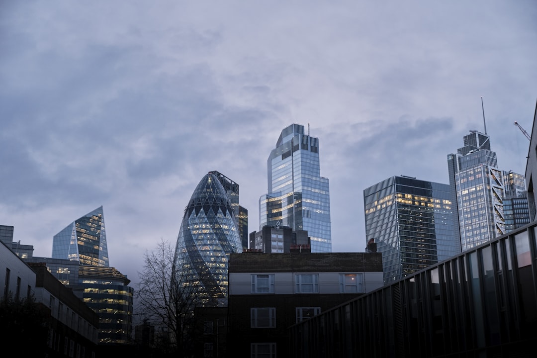 high rise buildings under gray sky, Skyline London @sunset in contrast with gray sky. View from Commercial Street.